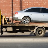 The Benefits of Using a Flatbed Towing Truck